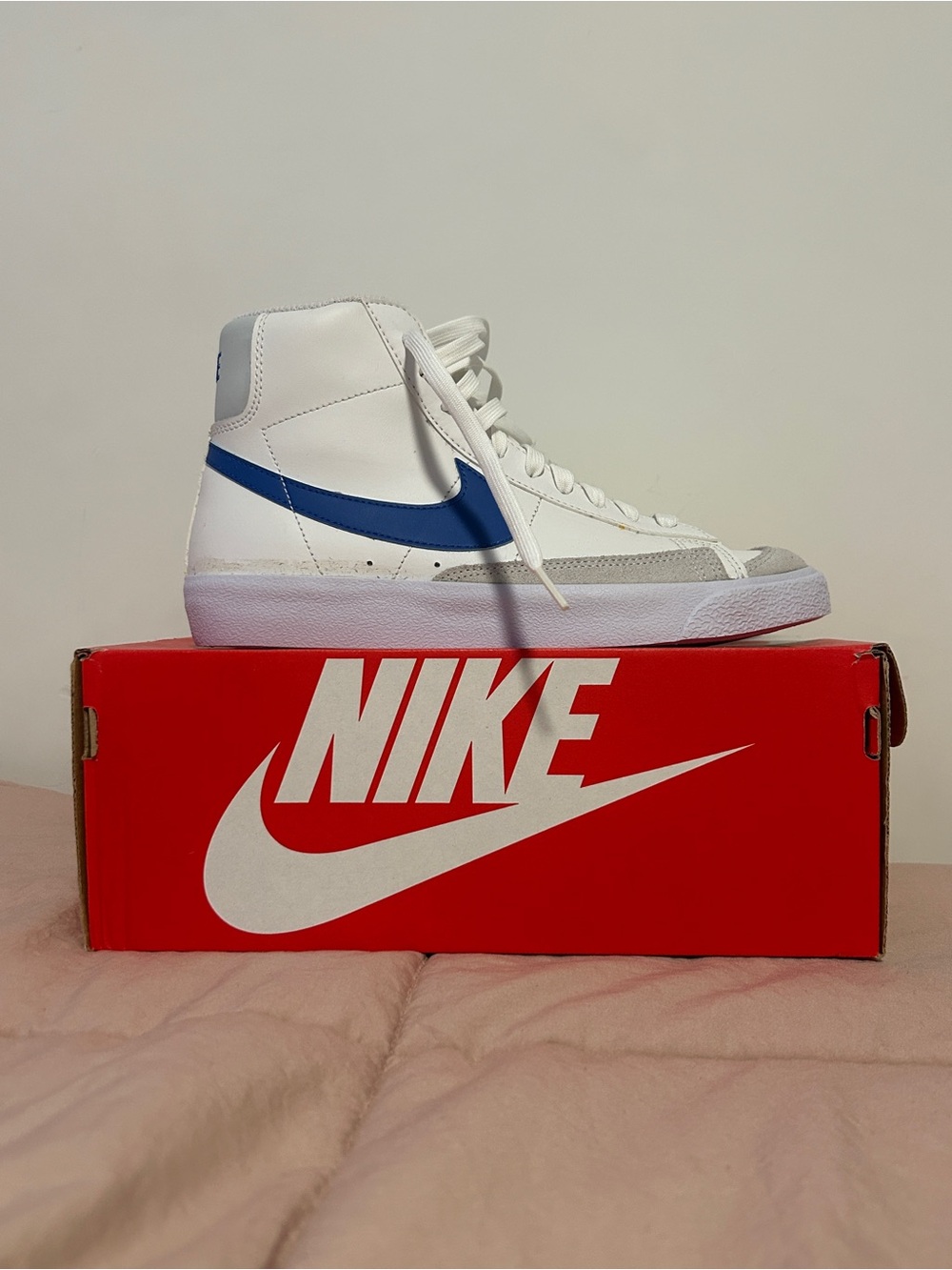 Nike Blazer Mid '77 white sneakers with Blue swoosh
